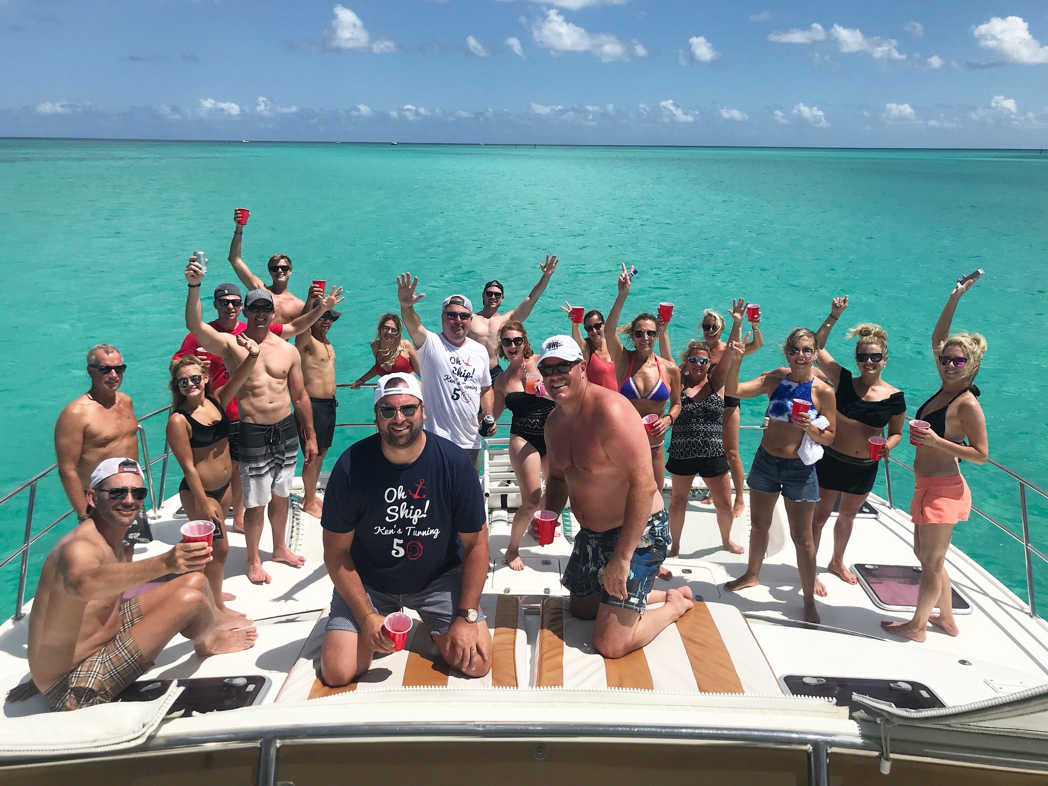 turks and Caicos private catamaran rental, groups drinking rum punch